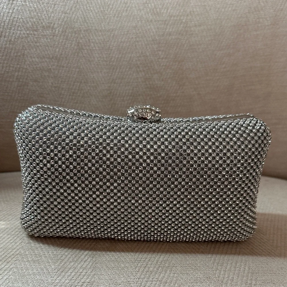 Bebe Sparkling Silver Clutch and Shoulder evening bag